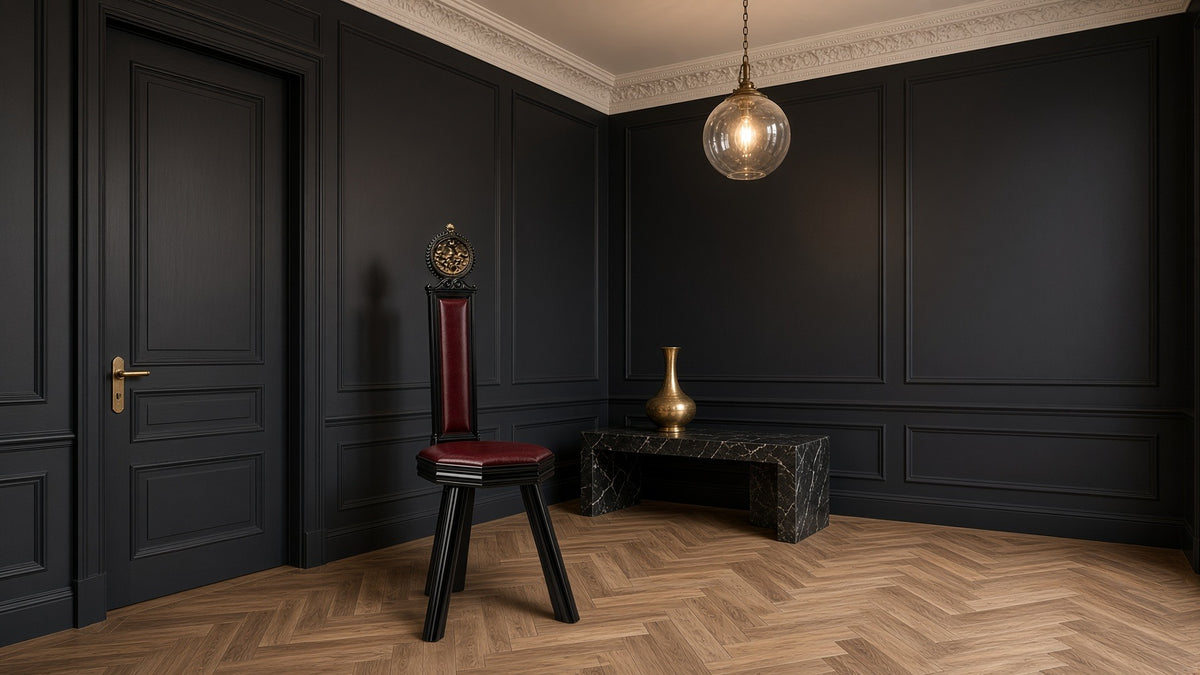 Aquila chair in a black panelled room with a glass pendant lamp
