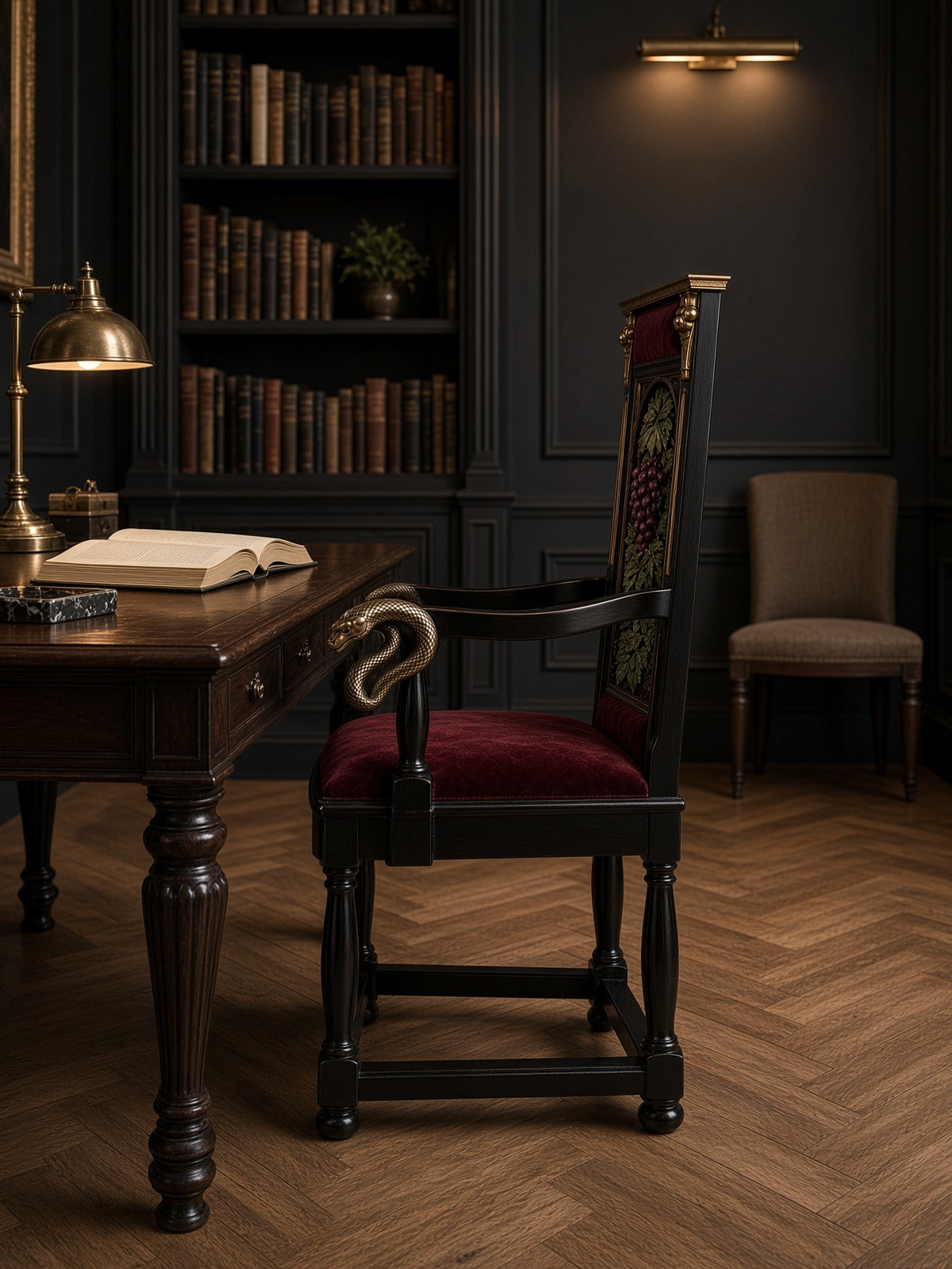 Bacchus armchair at a writing desk in a dark library