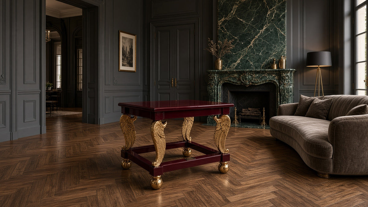Cupid's Wings table in deep burgundy in a dark panelled salon