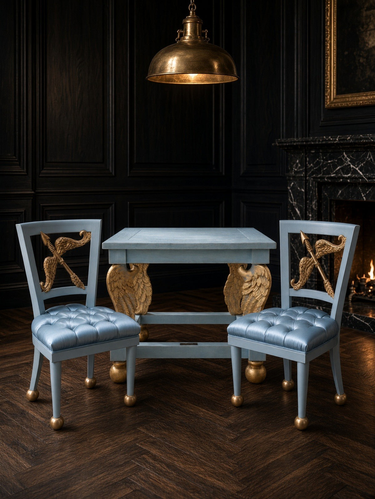 Cupid's Wings table with two Cupid chairs in a dark room