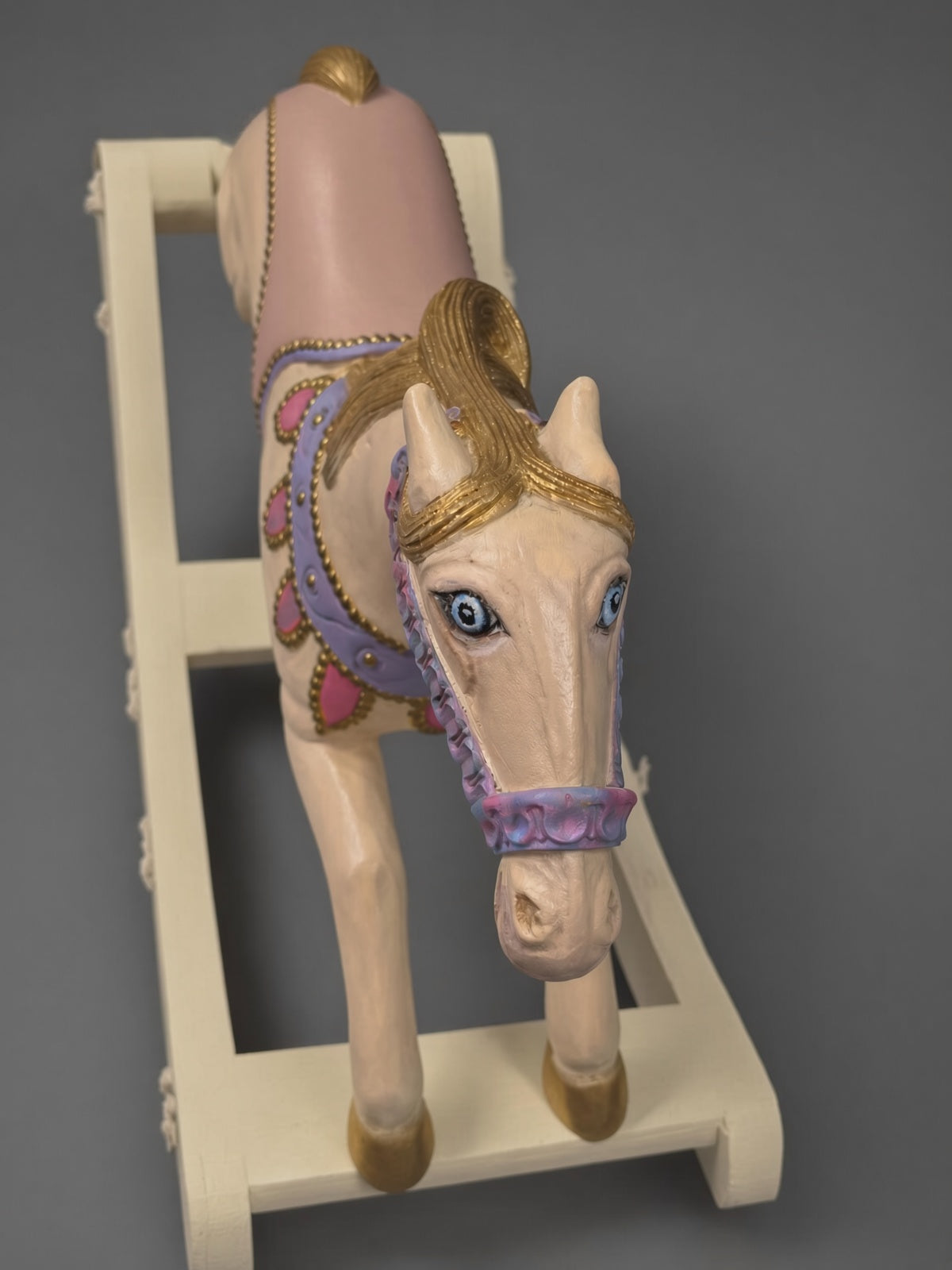 Hand-painted antique rocking horse in cream, pink and gold, Kiyan Studio